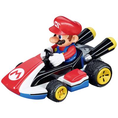 A toy car with a figurine wearing red and blue clothing and a red cap, seated at the wheel, with large yellow wheels.