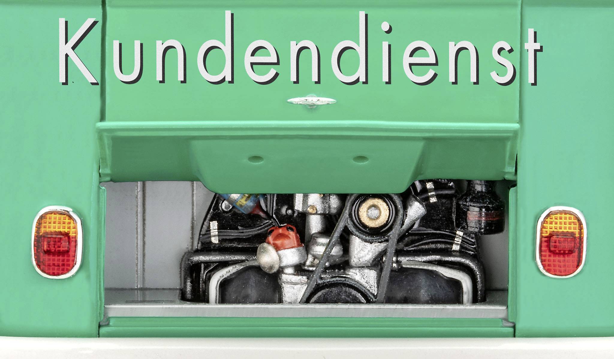 An open green vehicle boot reveals an engine. Above it is the word 'Customer Service'.<br><br>Note: In British English, "boot" is used instead of the American "trunk" when referring to the storage compartment of a car.
