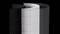 Illustration of a multi-layered air filter with a black carbon layer, followed by two white pleated and mesh layers on a black background.