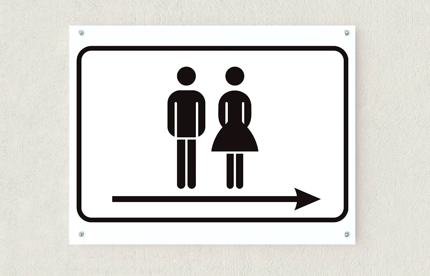 Sign with pictograms of a male and female figure, arrow pointing right, indicating direction to toilets.