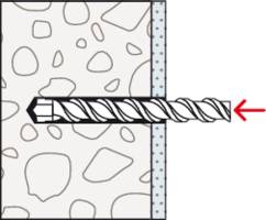 Drill boring a horizontal hole in a wall; red arrow indicates the direction of drilling. Wall with patterned stones.