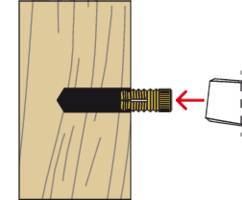 Step-by-step guide to securing a brass insert in a wooden object using a screwdriver.