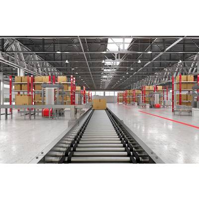 A large warehouse with a conveyor belt running down the centre. Shelves laden with boxes surround the belt. Bright light streams in from above.
