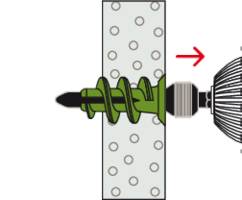 A green wall plug is screwed through a wall. The red arrow indicates the direction of rotation, which represents the drilling motion.