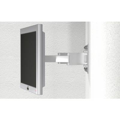 A silver-coloured monitor mount is fixed to a white wall. The arm is adjustable and supports a flat-screen display.