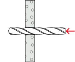 A drill penetrates a board from left to right, with a red arrow marking indicating the drilling direction.