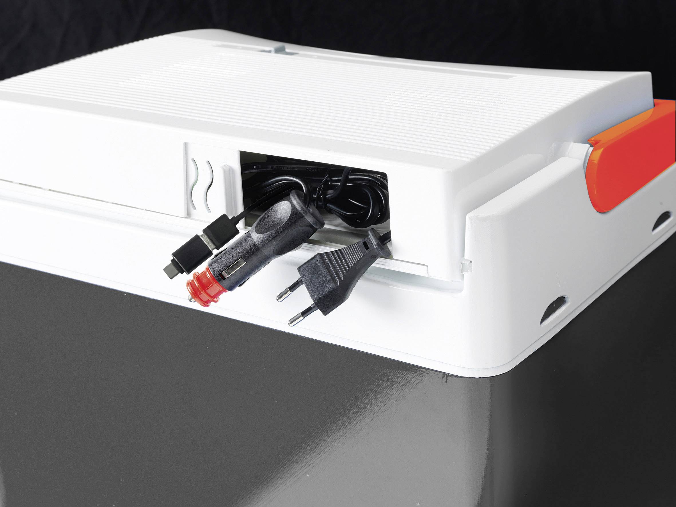 A white mobile refrigerator shows open storage with visible power cables and plugs.