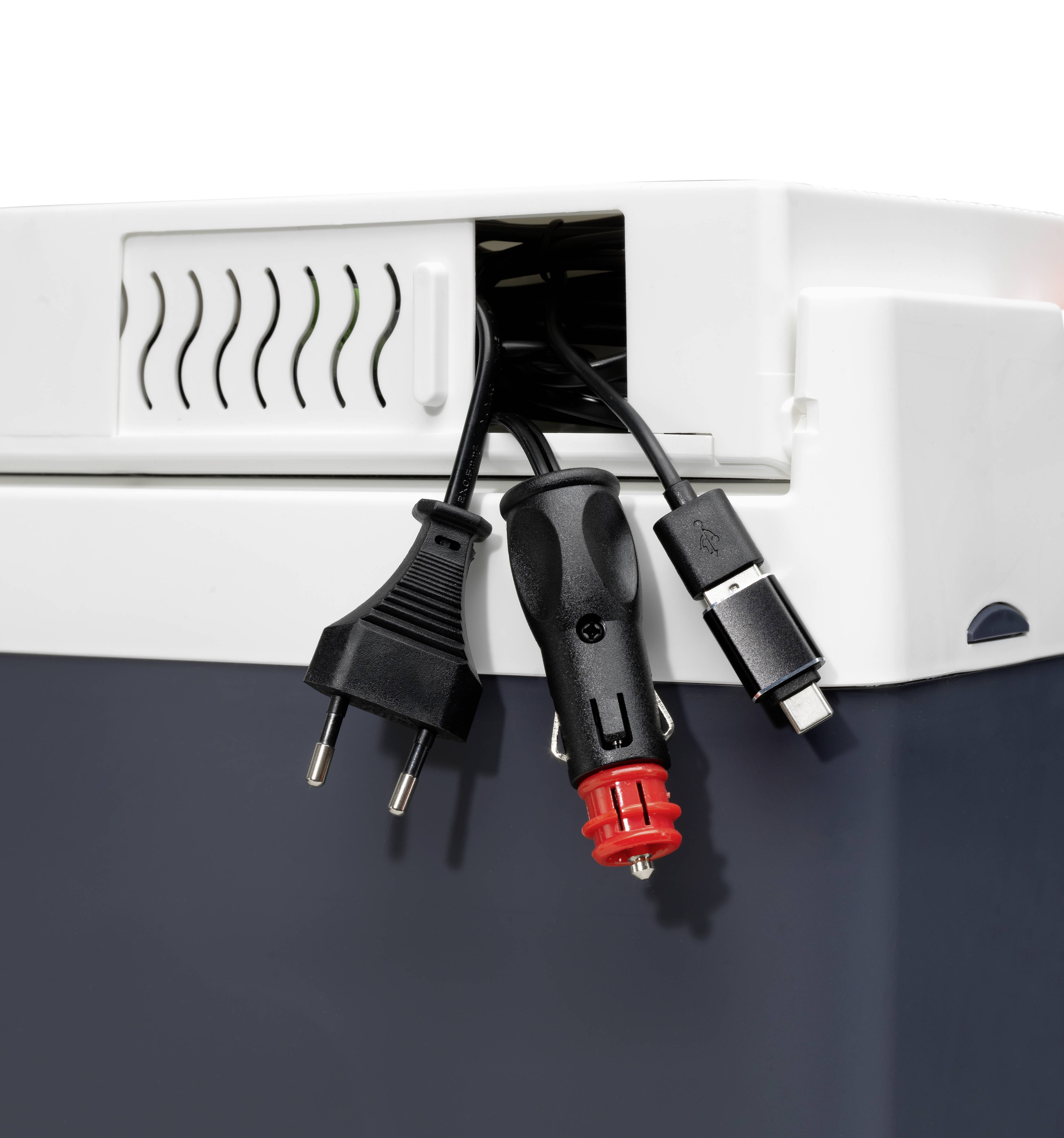 A portable cool box with protruding cables: a black EU plug, a red cigarette lighter plug, and a USB plug.