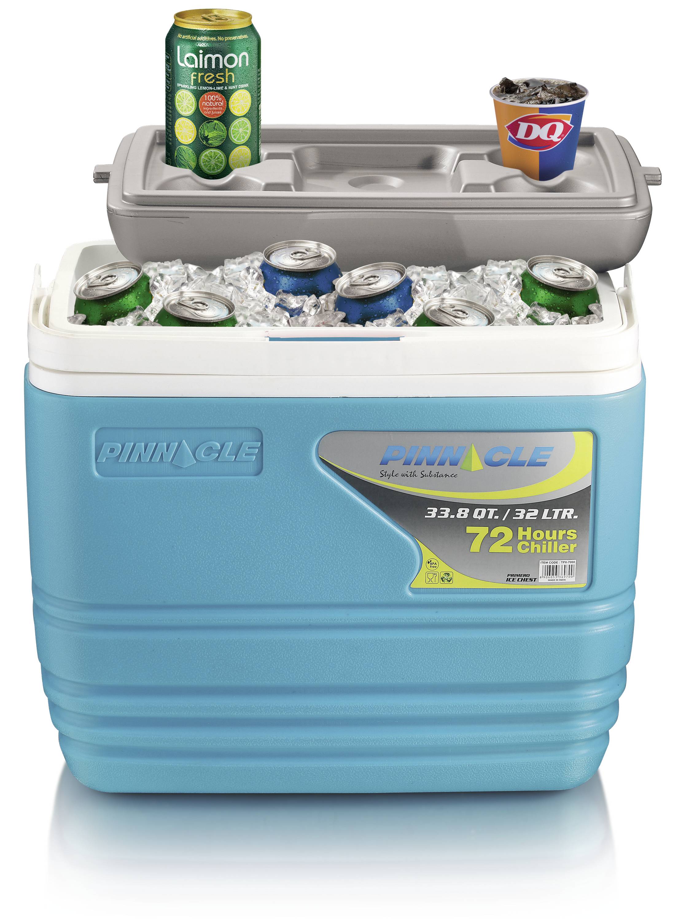A blue cool box with its lid open, filled with ice-cold drink cans. On top, there is a drink can and a DQ cup.
