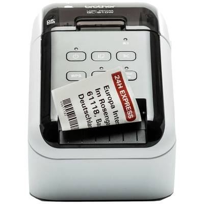 A label printer prints a label with the text 'Europa Inn, Rosengarten, 61118 Bad Vilbel, Germany, 24H EXPRESS'.