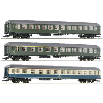 Three model railway passenger carriages in different colour schemes: green, dark green with a yellow line, and blue-cream. All are realistically detailed.