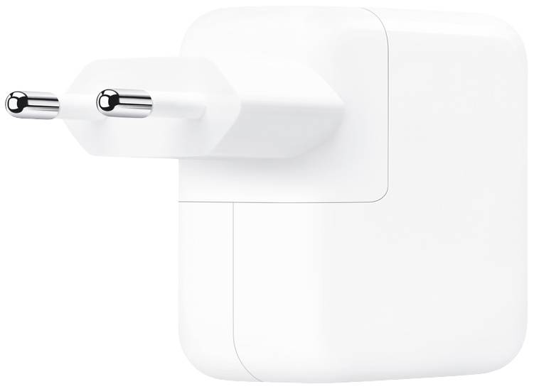 A white, square charger with two metal pins for the European plug socket.