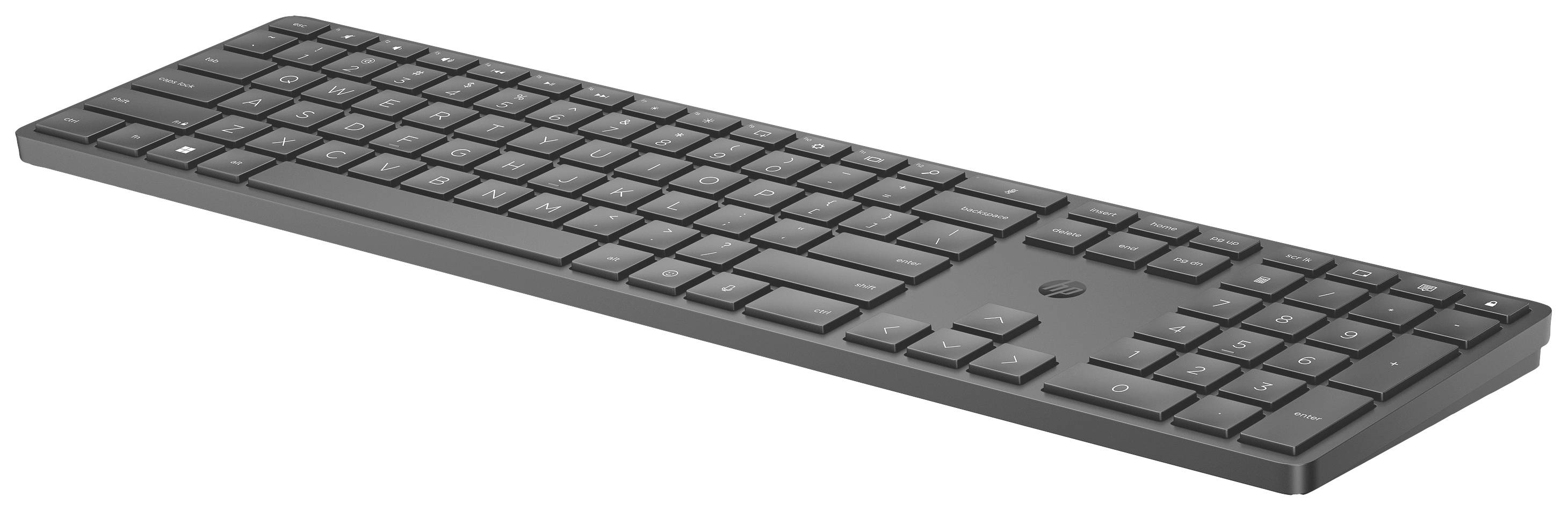 A wireless, black keyboard with a numeric keypad, hovers slightly angled upwards to the right. Minimalist design.