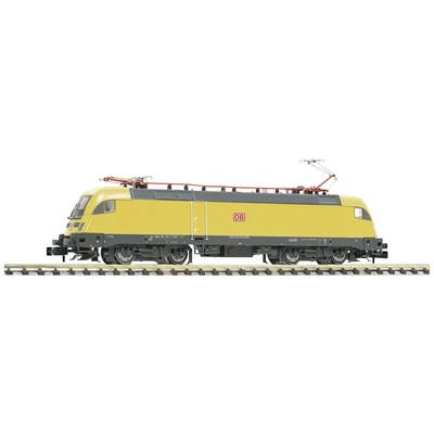Yellow electric locomotive of Deutsche Bahn on railway track. Profile view.