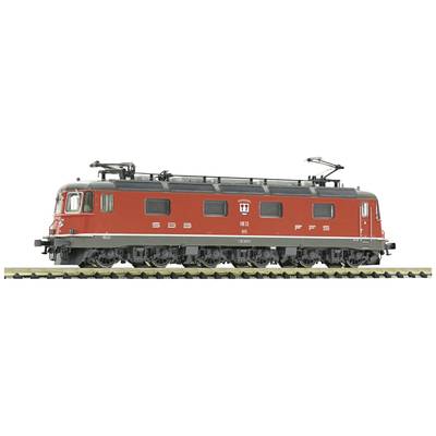 A red model of an SBB FFS electric locomotive on a track, model number 11179, with four axles and realistic details.