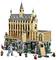 A LEGO set depicts a castle, surrounded by figures from a fantasy world, representing scenes with various creatures and characters.