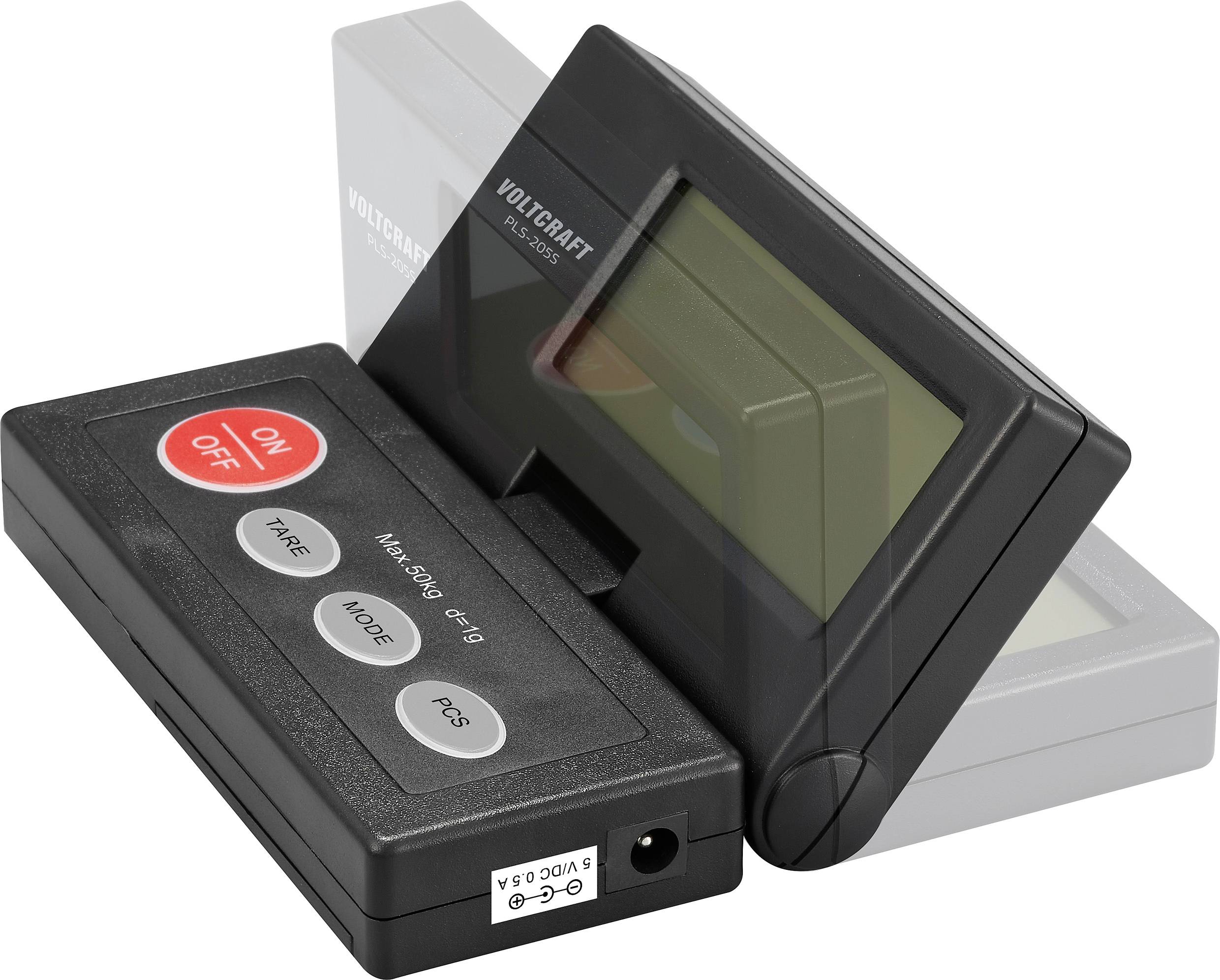 Portable folding voltmeter with display and controls visible. Buttons for 'ON/OFF', 'Tare', 'Mode', and 'PCS'.