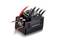 An electronic controller with multiple cables; displays the reading 'A18'. The device is compact and black with heat sinks.
