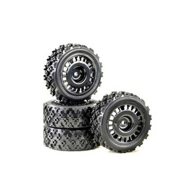 Two stacked and two leaned black, heavily treaded tyres for remote-controlled cars on a white background.