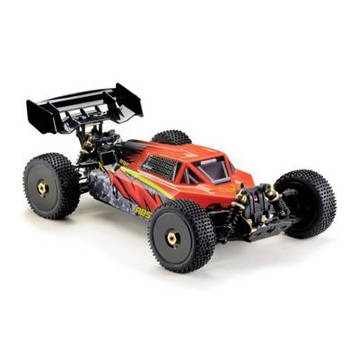 A red remote-controlled racing car with large off-road tyres and a black rear spoiler on a white background.