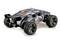Remote-controlled car with grey and black camouflage pattern and large rubber tyres. Rear view with visible spoiler.