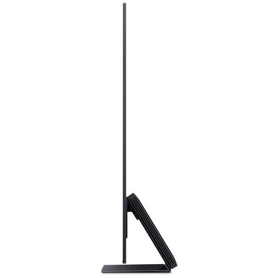 Side view of a modern, slim monitor on a narrow stand. The screen is extremely thin and minimalist in design.