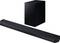 Black soundbar and matching subwoofer on a white background. The devices are sleek and modern in design, perfect for home cinema.