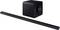 Soundbar and subwoofer in a contemporary design. The soundbar is long and slim; the subwoofer is cube-shaped. Suitable for home cinema.
