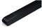 Black soundbar with rounded corners and a fine mesh structure, combining modern design and high-quality audio technology.
