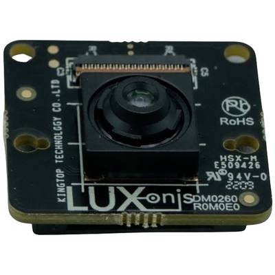 A small, square camera with a central lens and labels such as 'LUX' and technical specifications on the circuit board.
