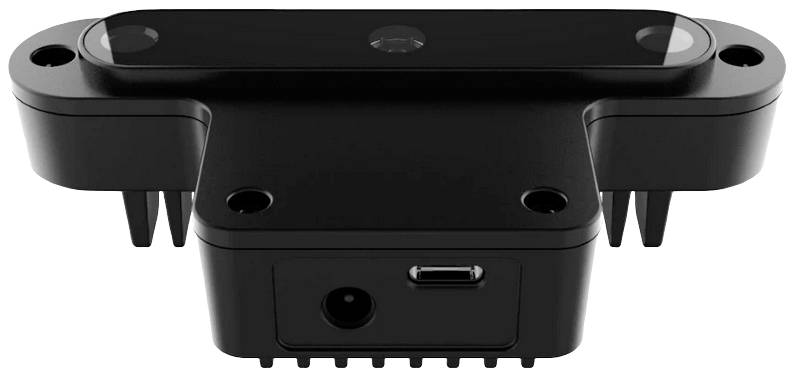 Black infrared camera with two lenses, rectangular shape, USB port at the bottom. Developed for 3D scanning or depth sensing.