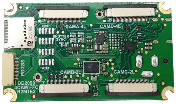 Electronic circuit board with multiple connections and a small SD card slot on a green circuit board.