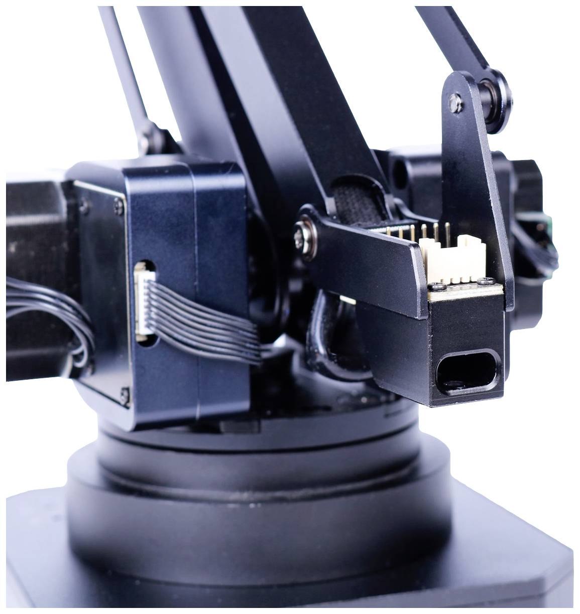 Industrial robotic arm with cable connections, used for precise manufacturing tasks.