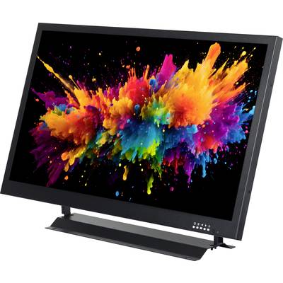 A monitor displays a screen with a vibrant colour splash in red, yellow, blue, and purple, conveying dynamic energy.