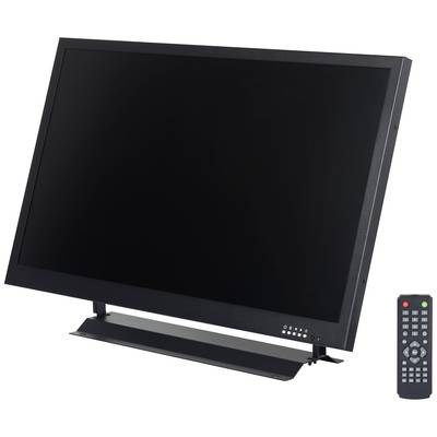 A wide black flat-screen television with a black frame, mounted on a stand. A black remote control sits to the right of it.