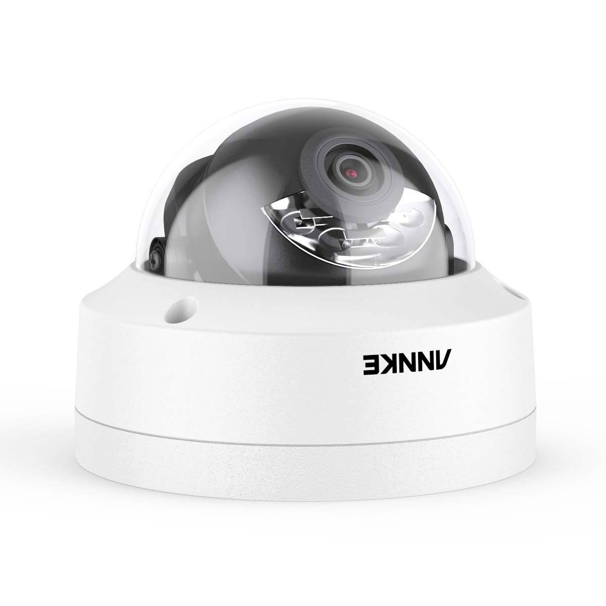 Dome surveillance camera with transparent cover and dark housing. Ideal for indoor security monitoring.