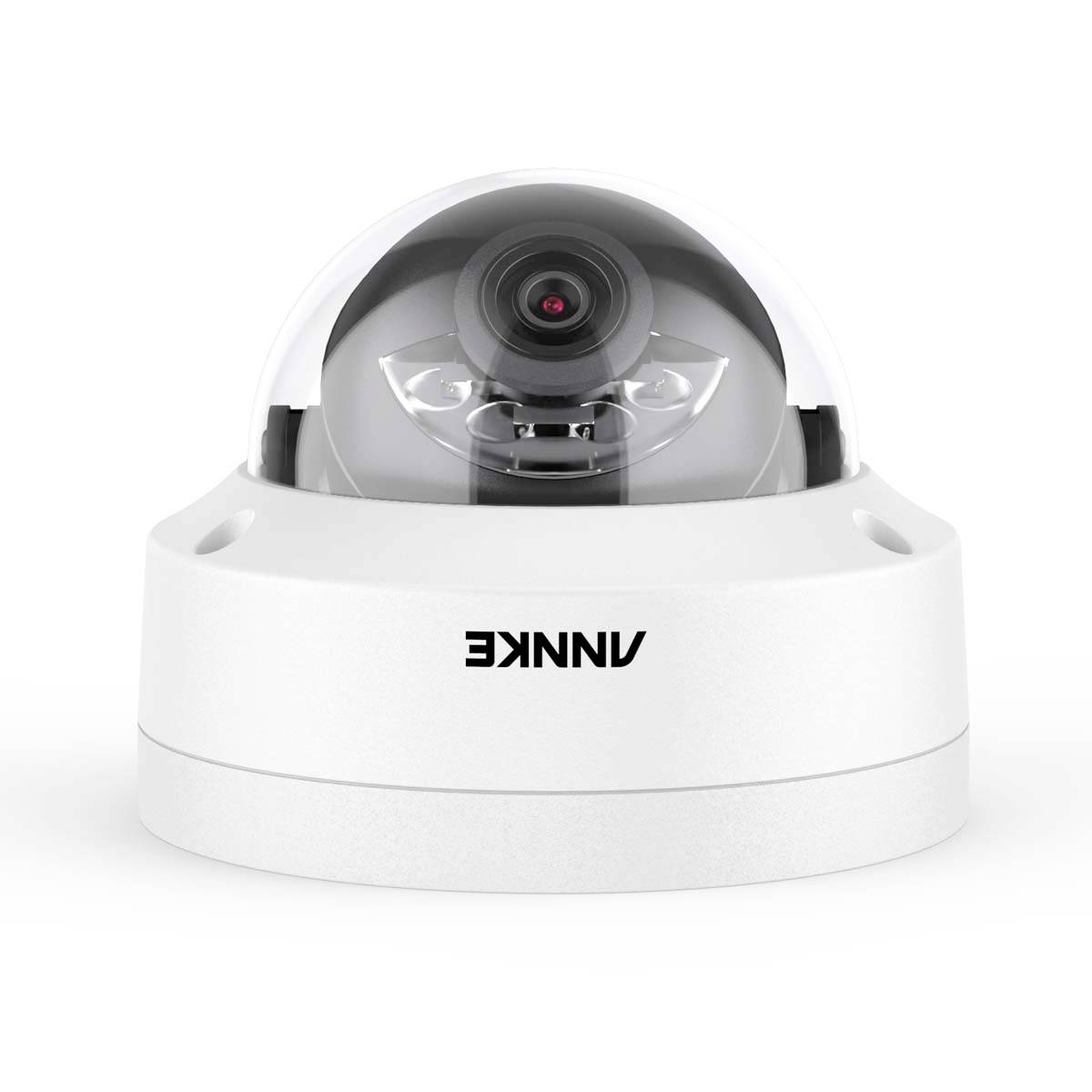 Surveillance camera with a semi-spherical housing. It has a lens and is mounted on a white base.