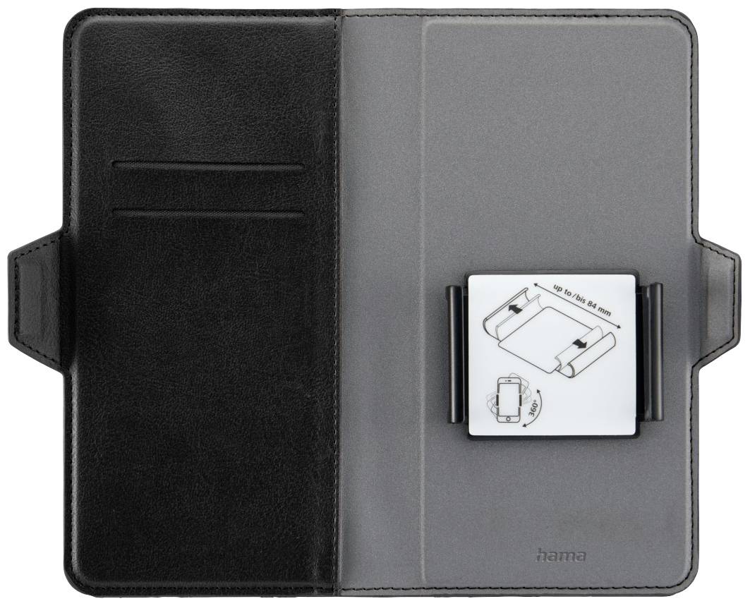 Open black table cover with card slots on the left. On the right, a holder with a pictorial guide for securing a device.