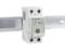 A WiFi time switch mounted on a DIN rail, displays LED indicators for WiFi and time control. Suitable for use in electrical control cabinets.