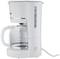 A white filter coffee machine with a glass carafe and water level indicator.