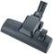 Black vacuum cleaner brush with pivoting joint for floor cleaning.