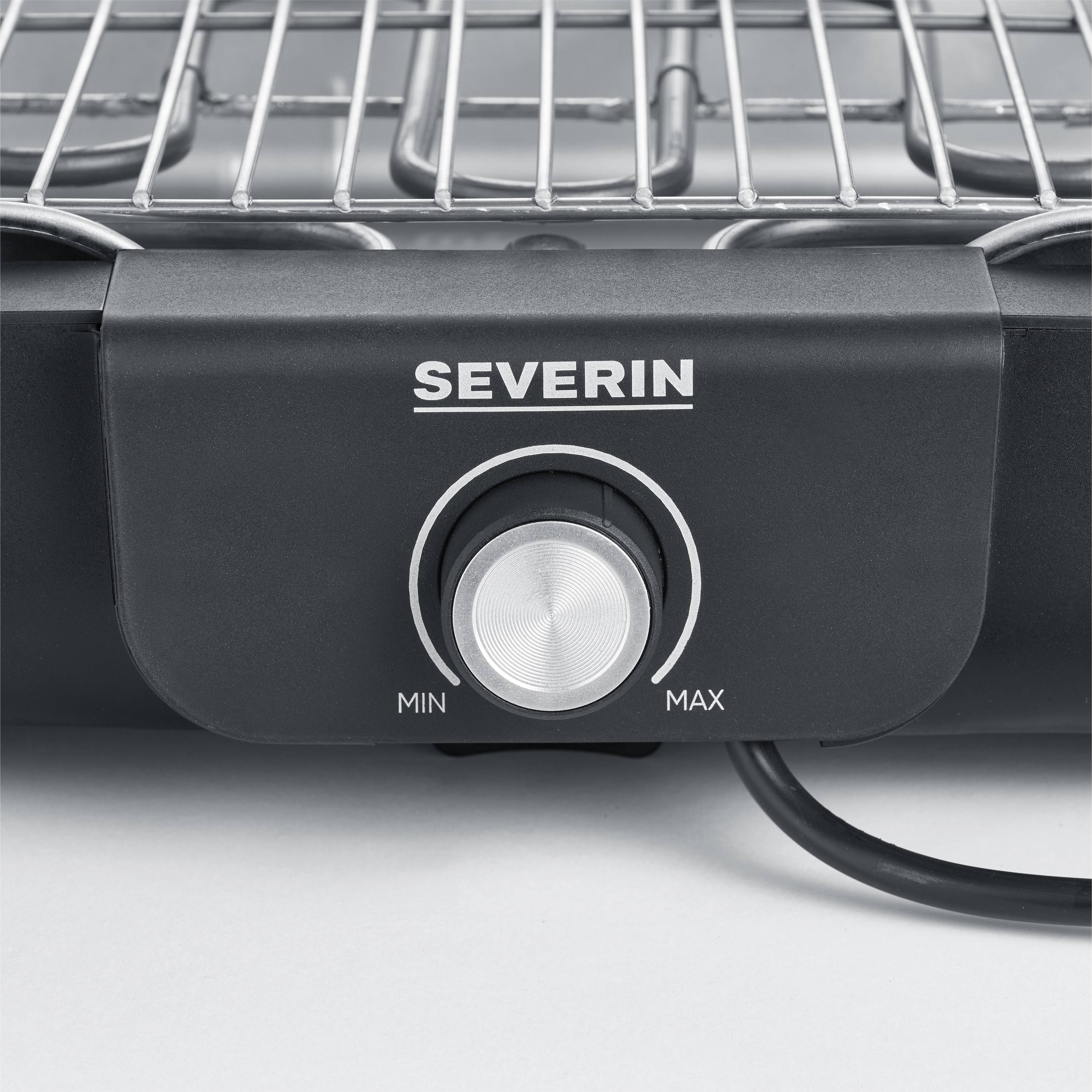 Image of an electric grill appliance with a rotary control dial. The brand name 'Severin' is visible above the dial, which is positioned between 'Min' and 'Max'.
