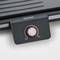 Electric barbecue with temperature control, adjustable from Min to Max, showcasing a modern design with a grey surface.