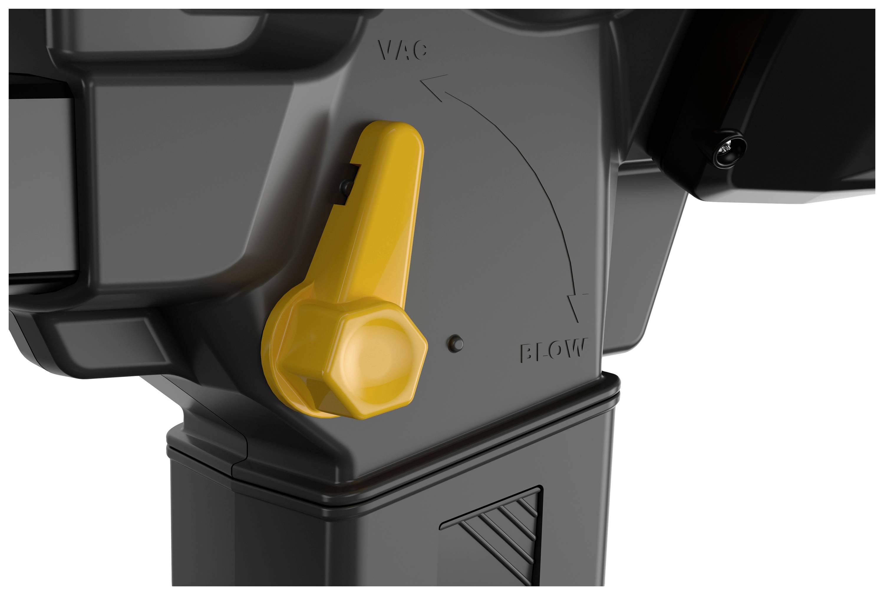 A black device with a yellow lever for controlling airflow, marked with 'VAC' and 'BLOW' to adjust the function.