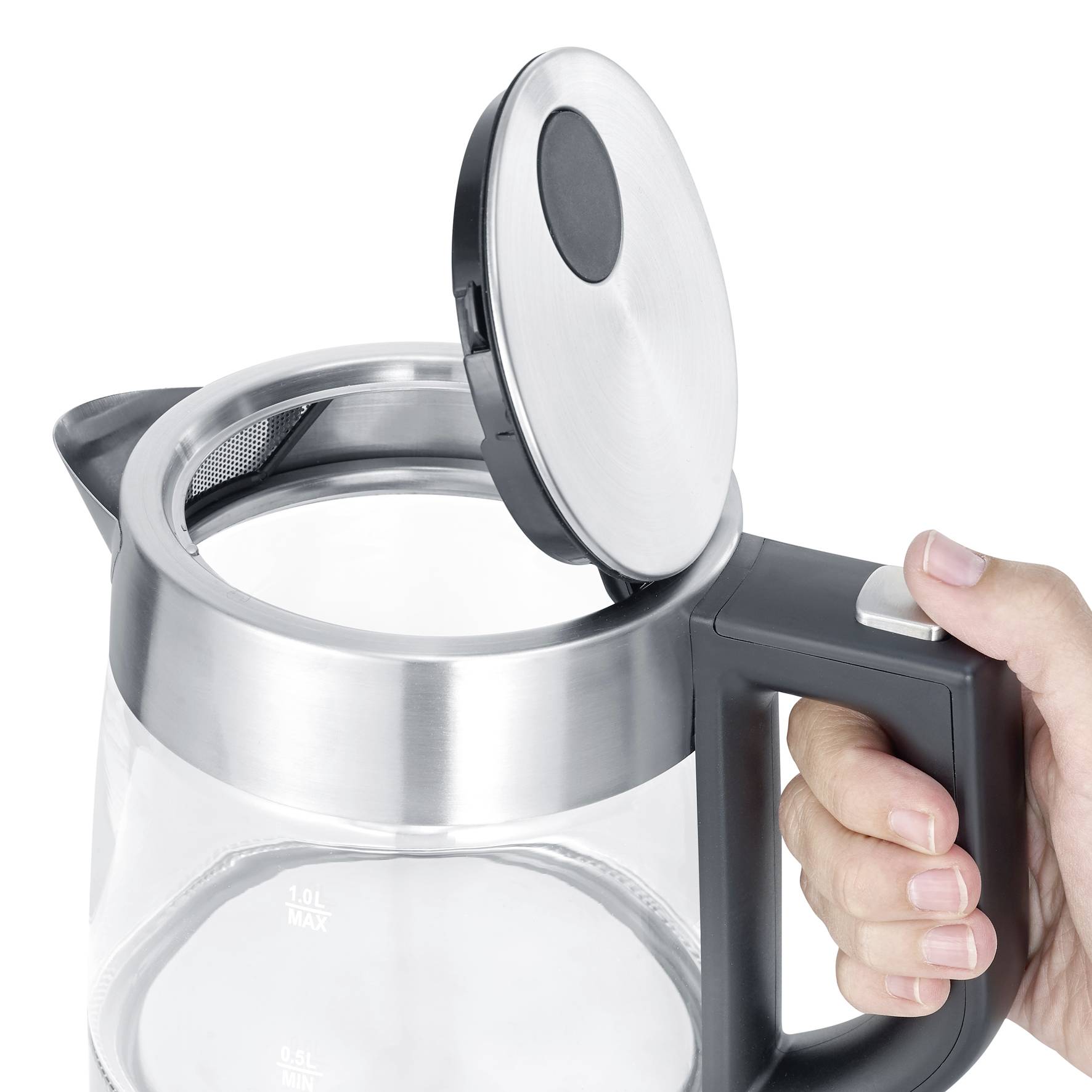 A hand lifts the lid of a glass electric kettle. The kettle is partially filled and shows a maximum fill scale.