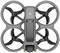 Quadcopter from above view with four circular propellers and grey casing.
