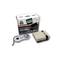 Compact retro console with a minimalist controller in front of packaging displaying designs and games.