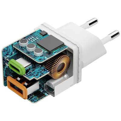 Cross-section of a white charger revealing its internal electronics, including a coil and circuitry, with USB ports in various colours.