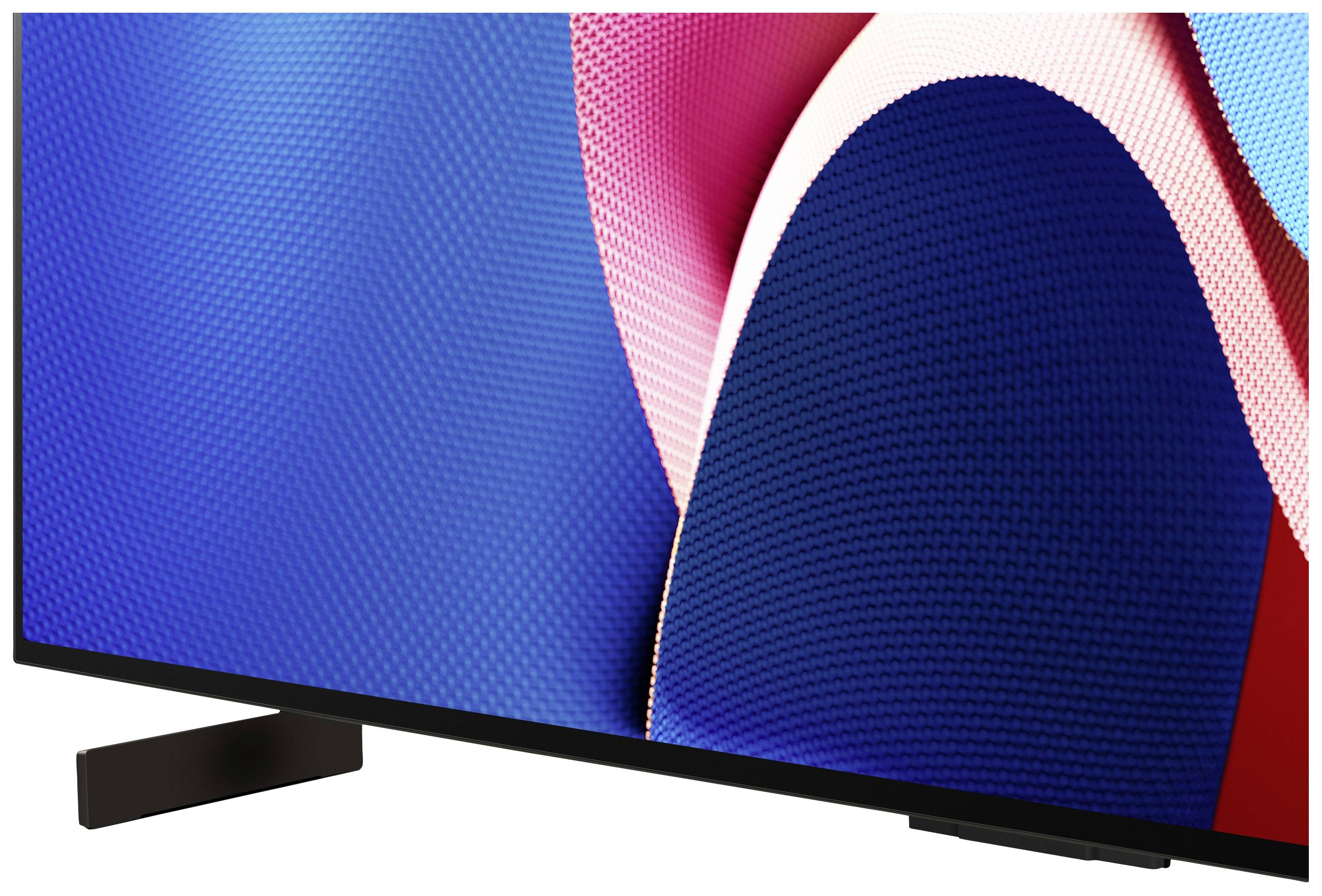 The lower part of a modern television with a colourful, abstract background on the screen.