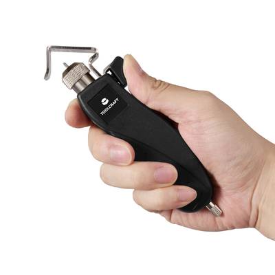 A hand is holding a black tool, presumably an electric knurling tool by the brand TOOLCRAFT, with a metal attachment.